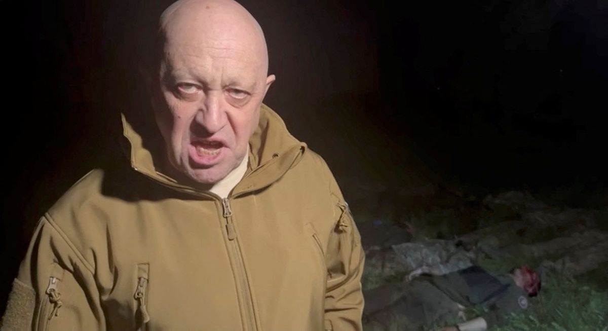 Wagner Group founder Yevgeny Prigozhin speaks next to the bodies of what he says are Wagner fighters killed in Ukraine. 