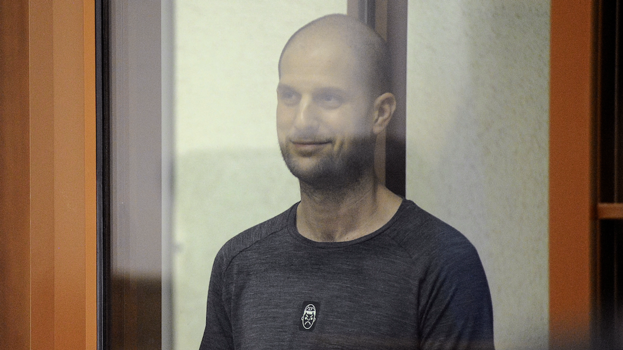 Wall Street Journal reporter Evan Gershkovich has been sentenced to 16 years on espionage charges. He is seen here in court on July 19.