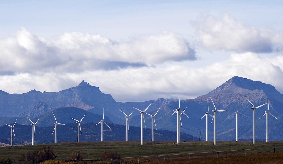 Windmills generate electricity in the windy rolling foothills of the Rocky Mountains near the town of Pincher Creek, Alberta, September 27, 2010. 