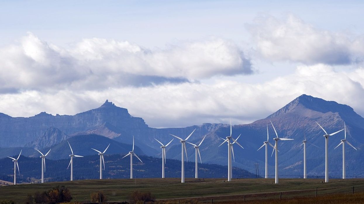 Windmills generate electricity in the windy rolling foothills of the Rocky Mountains near the town of Pincher Creek, Alberta, September 27, 2010.