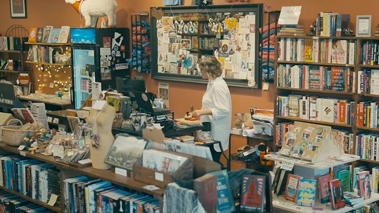 Woman at the cash counter of a bookstore