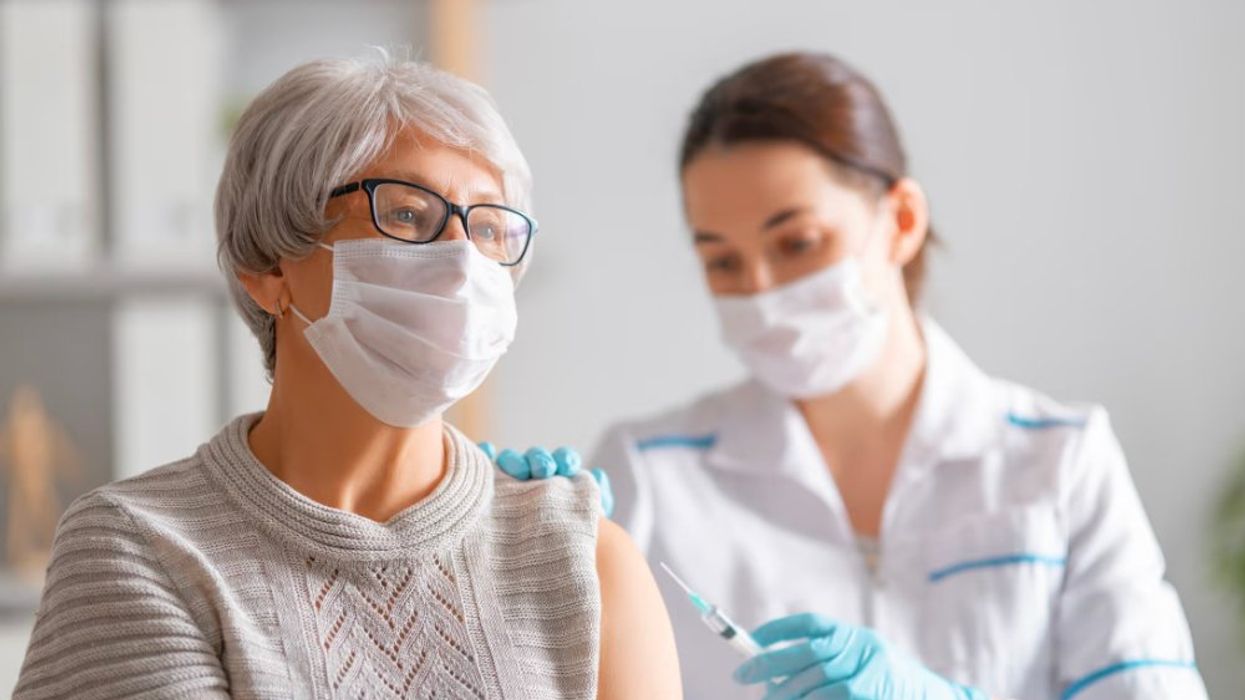 Woman getting vaccinated