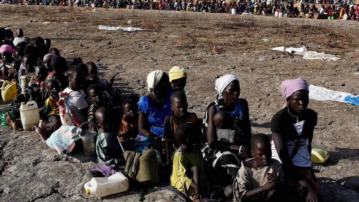 Women and children wait for food distribution from the United Nations World Food Programme in Thonyor, Leer state, South Sudan, back in 2017.