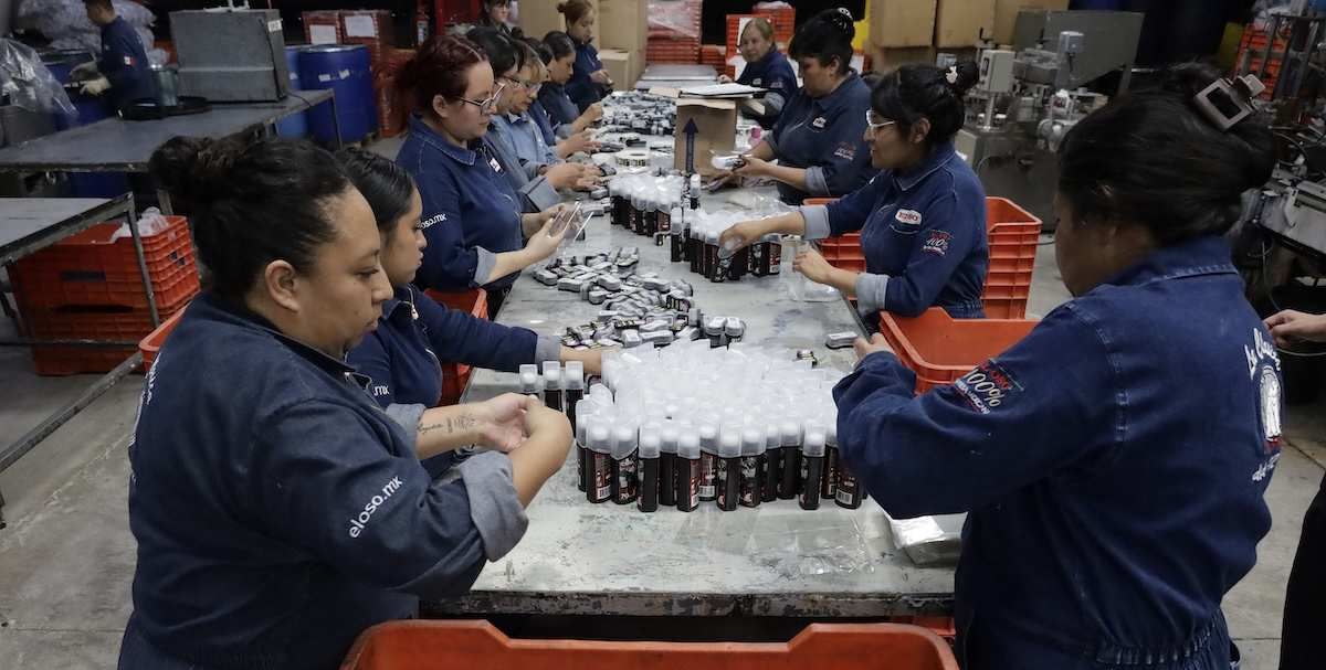 Women work in the plastic container assembly area inside the El Oso shoe polish factory, located in Mexico City, Mexico, in its new facilities, after officers from the Secretariat of Citizen Security and staff from the Benito Juarez mayor's office arbitrarily and violently remove their supplies, raw materials, machinery, and work tools on January 17 of this year following a coordinated operation stemming from a private dispute. On August 27, 2025.
