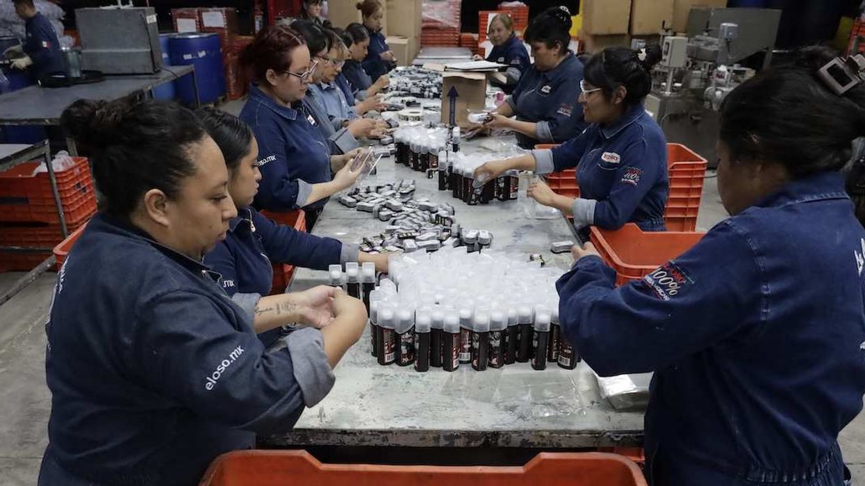 Women work in the plastic container assembly area inside the El Oso shoe polish factory, located in Mexico City, Mexico, in its new facilities, after officers from the Secretariat of Citizen Security and staff from the Benito Juarez mayor's office arbitrarily and violently remove their supplies, raw materials, machinery, and work tools on January 17 of this year following a coordinated operation stemming from a private dispute. On August 27, 2025.