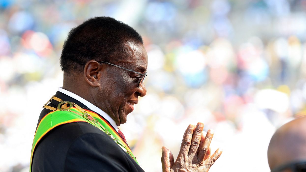 Zimbabwe President Emmerson Mnangagwa reacts after his inauguration at the National Sports Stadium in Harare, Zimbabwe
